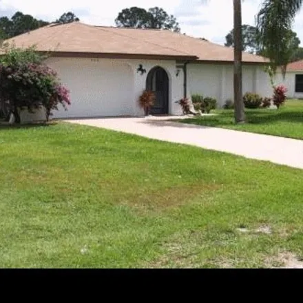 Buy this 2 bed house on 406 Roosevelt Avenue in Lehigh Acres, FL 33936
