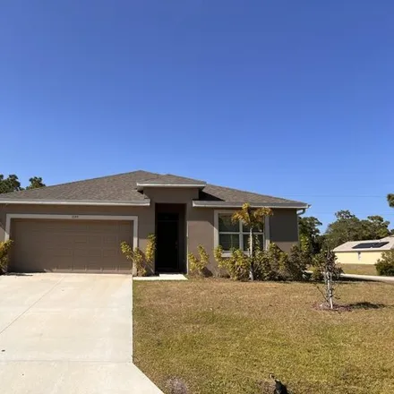 Buy this 4 bed house on Rada Street Southeast in Palm Bay, FL 32909
