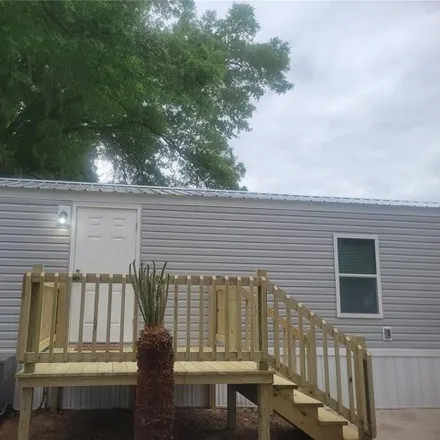 Buy this studio apartment on 4806 Southeast 149th Place in Marion County, FL 34491