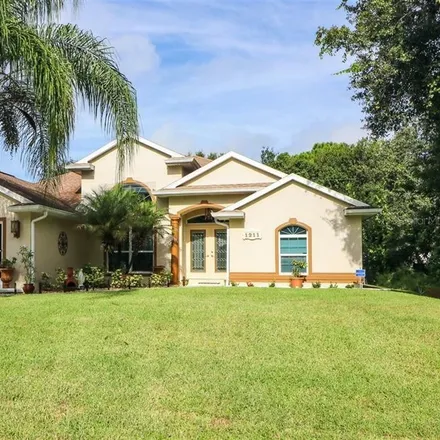 Buy this 3 bed house on 1211 Rizzo Street in Port Charlotte, FL 33952