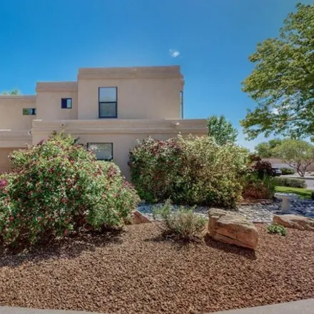 Buy this 4 bed house on Larrazolo Lane Northeast in Albuquerque, NM 87122