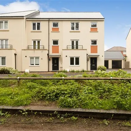 Rent this 4 bed townhouse on 13 Cobblestone Way in Cheltenham, GL51 8PW