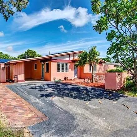 Buy this 3 bed house on 1321 Northeast 42nd Street in Coral Heights, Broward County