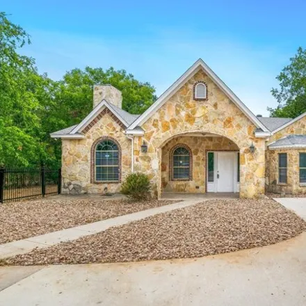 Rent this 4 bed house on 1610 Baker Street in Johnson County, TX 76058