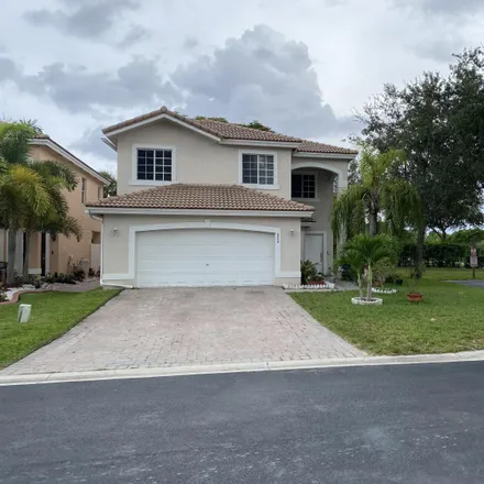 Buy this 4 bed house on 6003 Adriatic Way in Lake Belvedere Estates, Palm Beach County