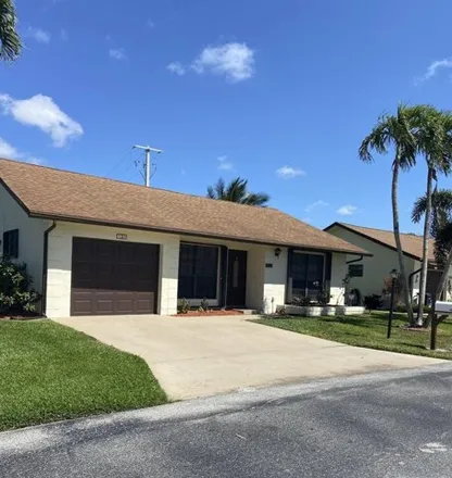Rent this 2 bed house on 6423 Olivewood Circle in Greenacres, FL 33463