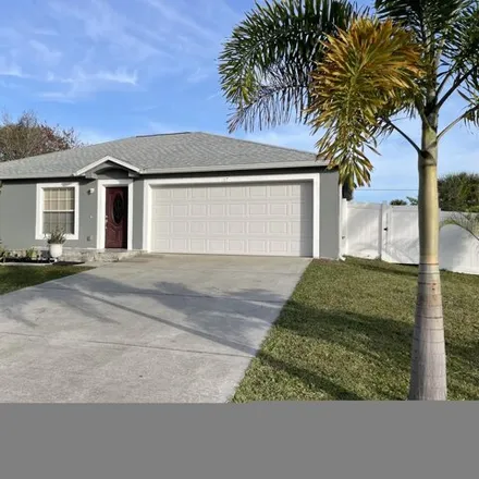 Buy this 4 bed house on 1558 Yukon Street Northeast in Palm Bay, FL 32907