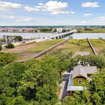 Buy this 8 bed house on 107 East Indian Avenue in Folly Beach, Charleston County