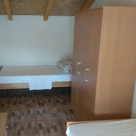 Rent this 2 bed house on 21468 Bogomolje