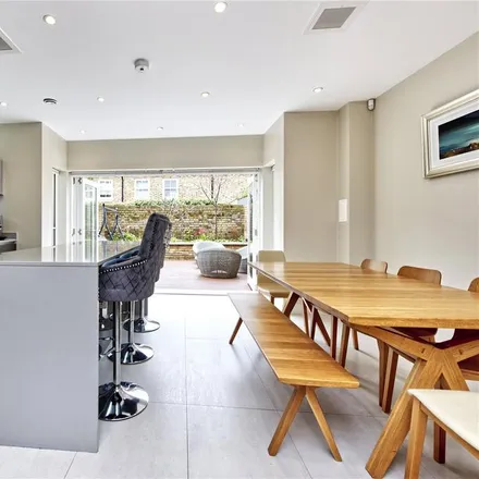 Rent this 5 bed townhouse on St Peter's Square in London, W6 9AA