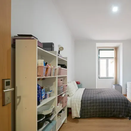 Rent this 21 bed room on Avenida António de Serpa in 1069-199 Lisbon, Portugal