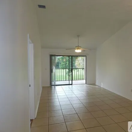 Rent this 2 bed condo on 4235 Gator Trace Avenue