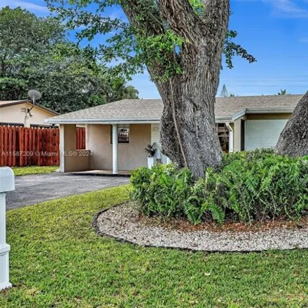 Rent this 4 bed house on 4633 Southwest 28th Avenue in Avon Park, Dania Beach