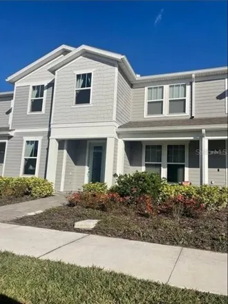 Rent this 4 bed townhouse on 14563 Orchid Island Dr in Orlando, Florida