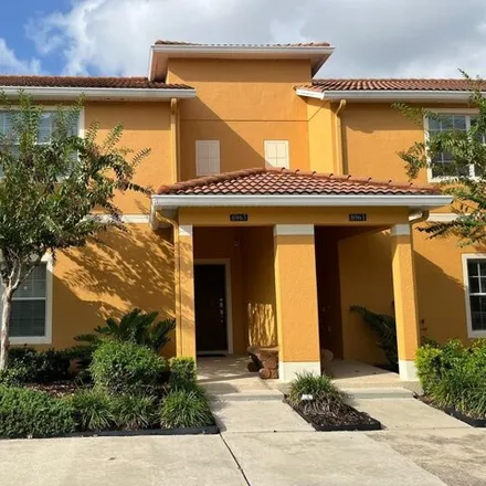 Buy this 4 bed townhouse on 8969 Bismark Palm Road in Osceola County, FL 34747