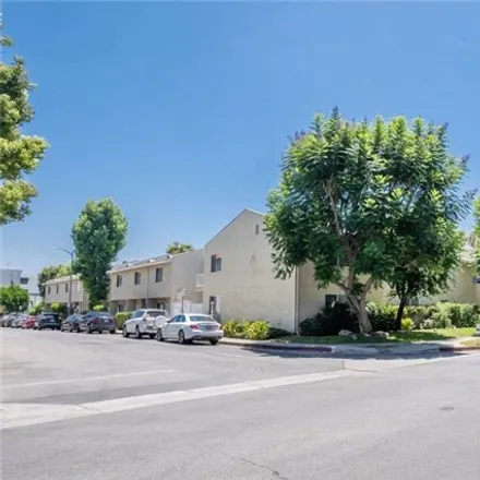 Rent this 2 bed townhouse on 4558 Willis Ave Unit 107 in Sherman Oaks, California