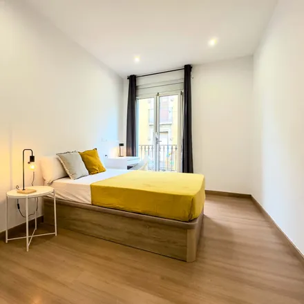 Rent this 1 bed room on Carrer Nou de la Rambla in 103, 08001 Barcelona