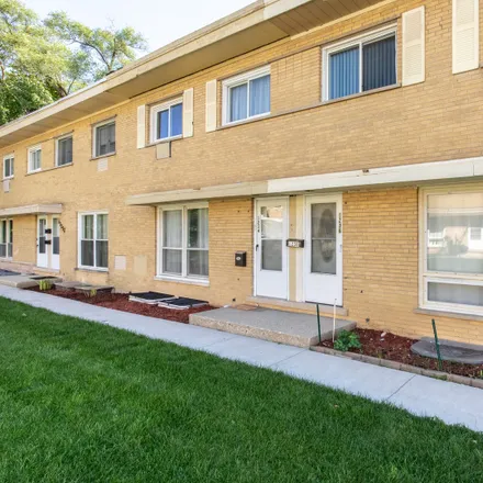 Buy this 3 bed townhouse on 1236 North Wheeling Road in Mount Prospect, IL 60056