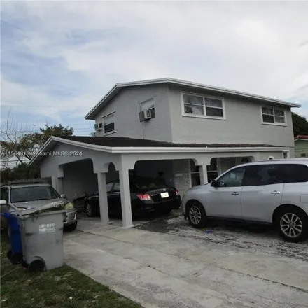 Buy this 5 bed house on 2428 Northeast 2nd Terrace in Pompano Beach, FL 33064