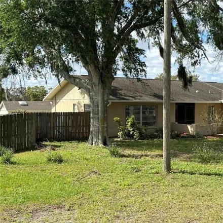 Buy this 2 bed house on 6044 Waycross Drive in Spring Hill, FL 34606