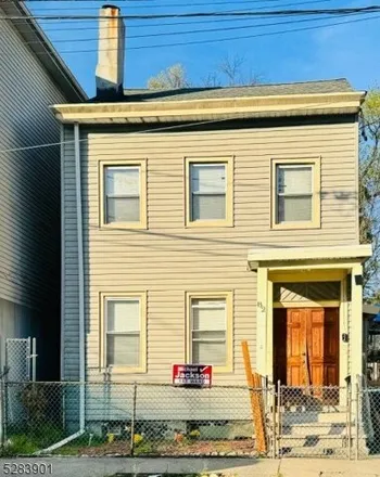 Buy this 5 bed house on 26 Garfield Avenue in Paterson, NJ 07522