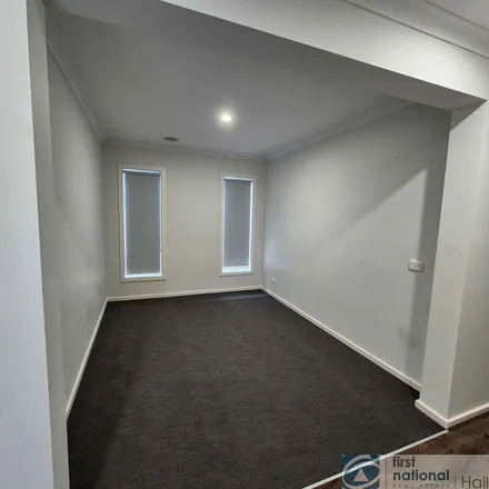 Rent this 4 bed apartment on 6 Adrian Street in Cranbourne East VIC 3977, Australia