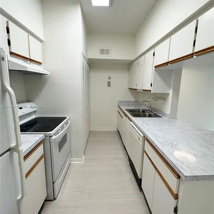 Rent this 1 bed apartment on 18340 Northwest 68th Avenue in Country Club, Miami-Dade County