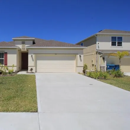 Rent this 4 bed house on Kylar Drive Northwest in Palm Bay, FL