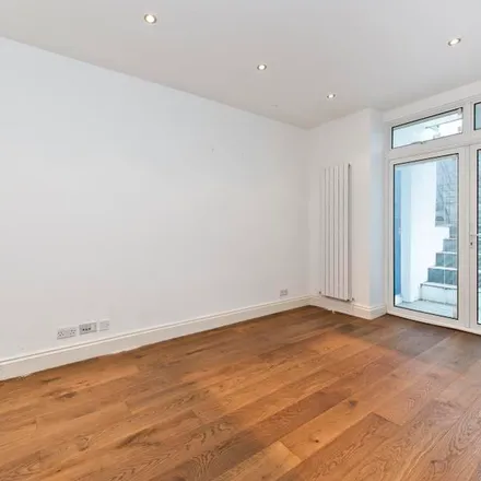 Rent this 3 bed apartment on The Queen’s Club in Palliser Road, London