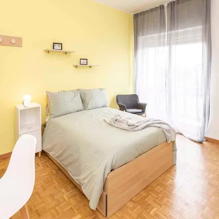 Rent this 4 bed room on Via Giovanni Pastorelli in 4a, 20143 Milan MI