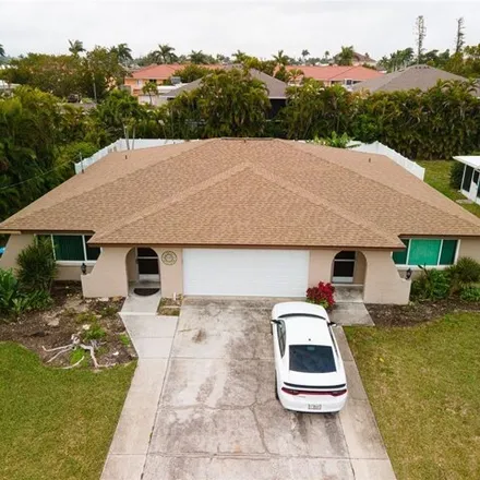 Rent this 3 bed house on 4230 Southeast 19th Place in Cape Coral, FL 33904