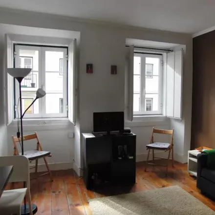 Rent this 1 bed apartment on Wooflix in Rua da Palmeira 46 - 54, 1200-313 Lisbon
