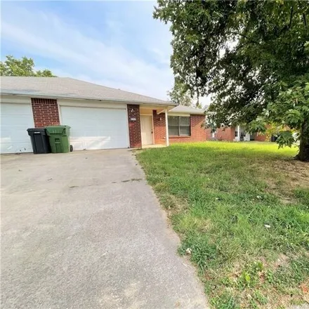 Rent this 2 bed house on 2219 West Roselawn Street in Rogers, AR 72756
