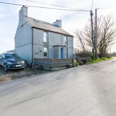 Buy this 4 bed house on unnamed road in Llanfflewyn, LL68 0TG