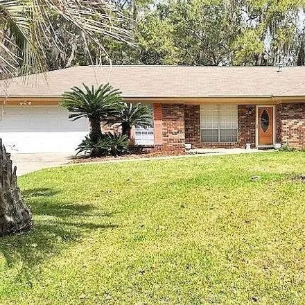 Rent this 3 bed house on 856 Old Mill Road in Colonial Oaks, Savannah