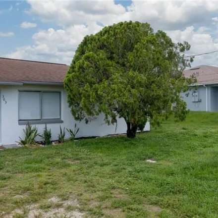 Rent this 2 bed house on 180 3rd Street Southwest in Lehigh Acres, FL 33973