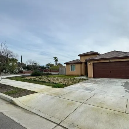 Buy this 4 bed house on 599 East Wutchumna Avenue in Woodlake, Tulare County