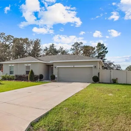 Buy this 4 bed house on 281 Begonia Lane in Polk County, FL 34759