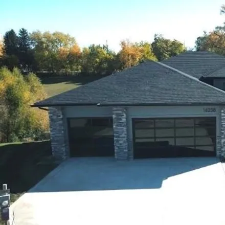 Buy this 5 bed house on Sunflower Circle in Urbandale, IA 50263