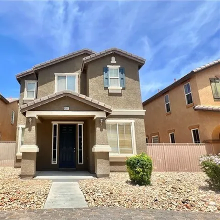 Rent this 4 bed house on Vatazi Lane in North Las Vegas, NV 89032