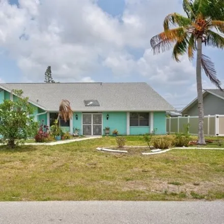 Buy this 4 bed house on 1233 Northeast 10th Lane in Cape Coral, FL 33909