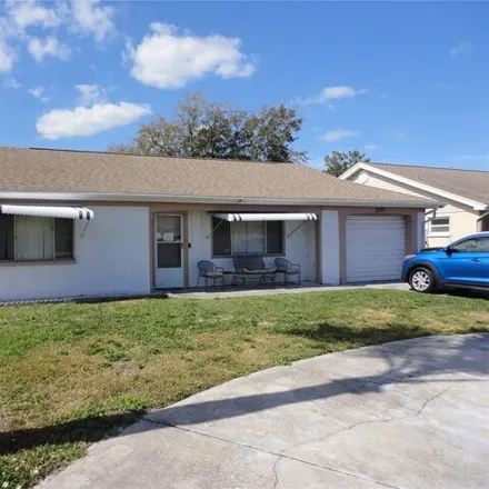 Buy this 2 bed house on 3951 Ming Tree Drive in Elfers, FL 34652
