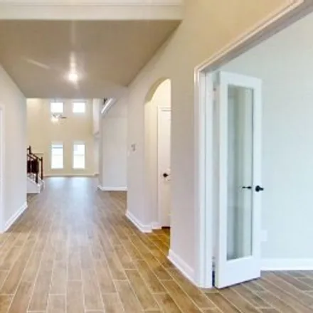 Rent this 5 bed apartment on 18906 Whistling Oaks Drive