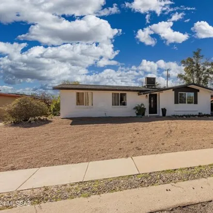 Buy this 4 bed house on 6926 East Kenyon Drive in Tucson, AZ 85710