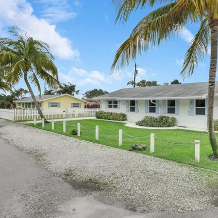 Buy this 8 bed house on 1717 Seder Lane in Juno Ridge, Palm Beach County