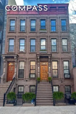 Buy this 4 bed house on 56 East 127th Street in New York, NY 10035