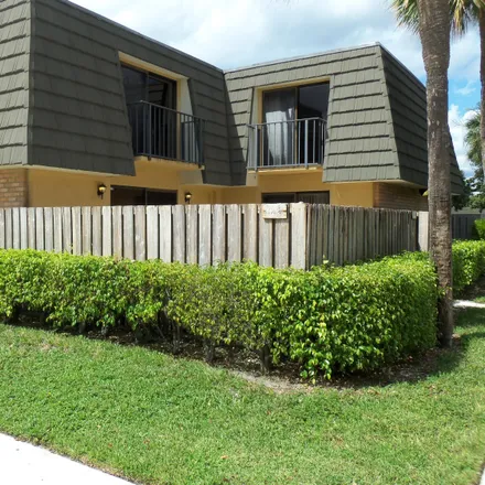 Rent this 2 bed townhouse on 1122 11th Way in West Palm Beach, FL 33407