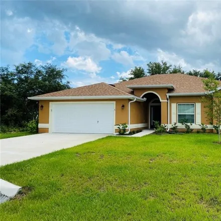 Rent this 3 bed house on 3 Firethorn Ln in Palm Coast, Florida