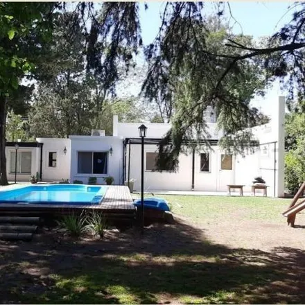 Buy this 4 bed house on Lasaigues Leloir Padel in De La Tradición 2042, Haras Miryam