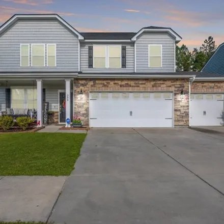 Buy this 4 bed house on 210 Witch Hazel Street in Cane Bay Plantation, SC 29486